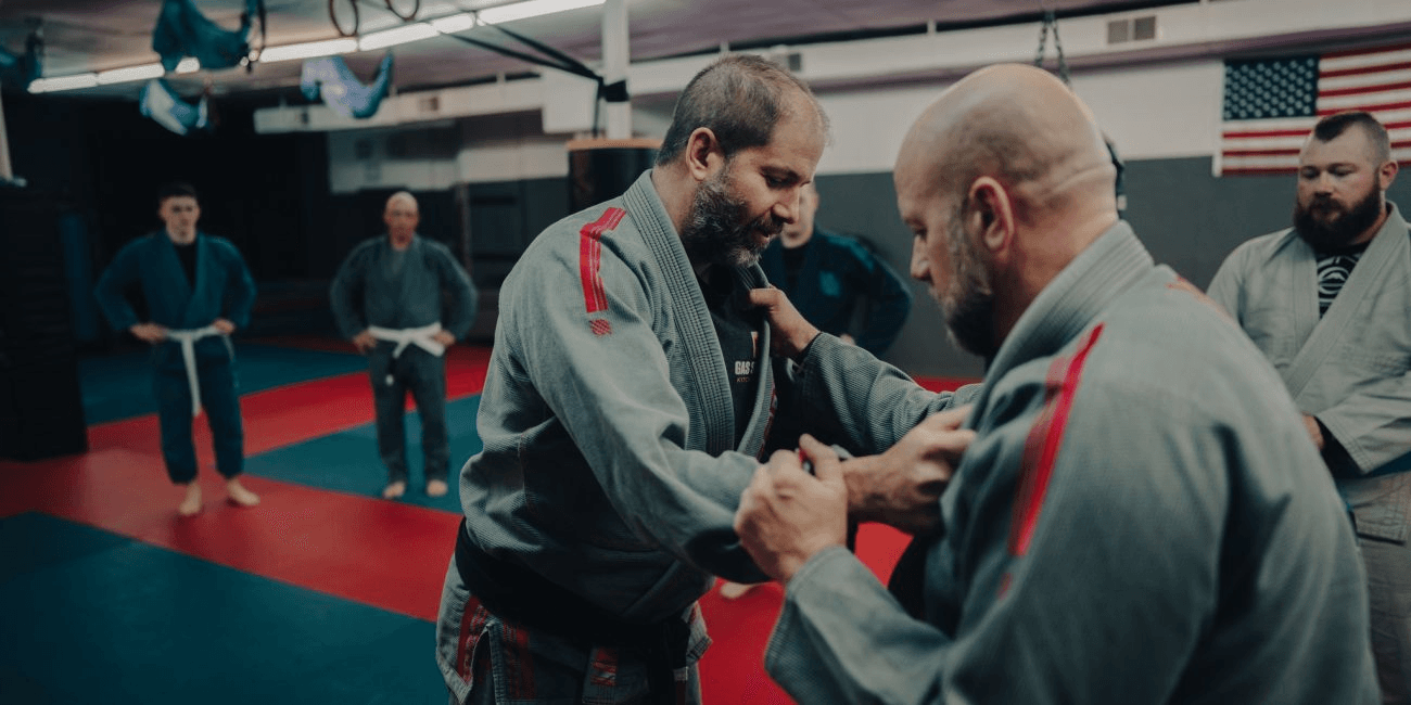 Two grapplers establishing grips during partner practice